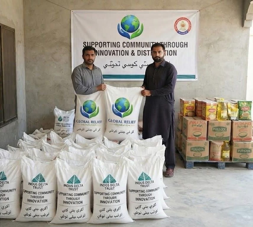 Sacks of flour and boxes of food prepared for distribution